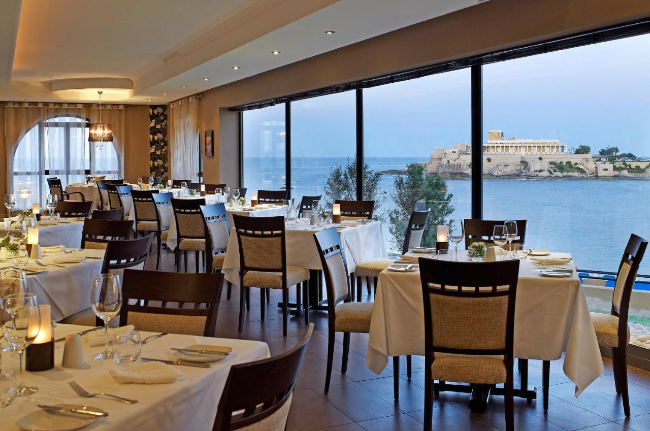 Corinthia St George'S Bay Hotel Saint Julian's Bagian luar foto The Phoenicia restaurant